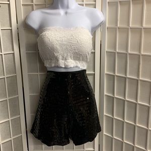 High-waisted women’s sequin short, clasp/zipper. New without tags, never worn.